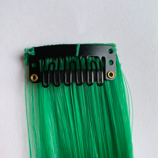 Clip in green hair extensions